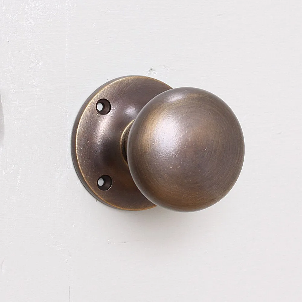 Distressed Antique Brass Cushion Door Knobs
