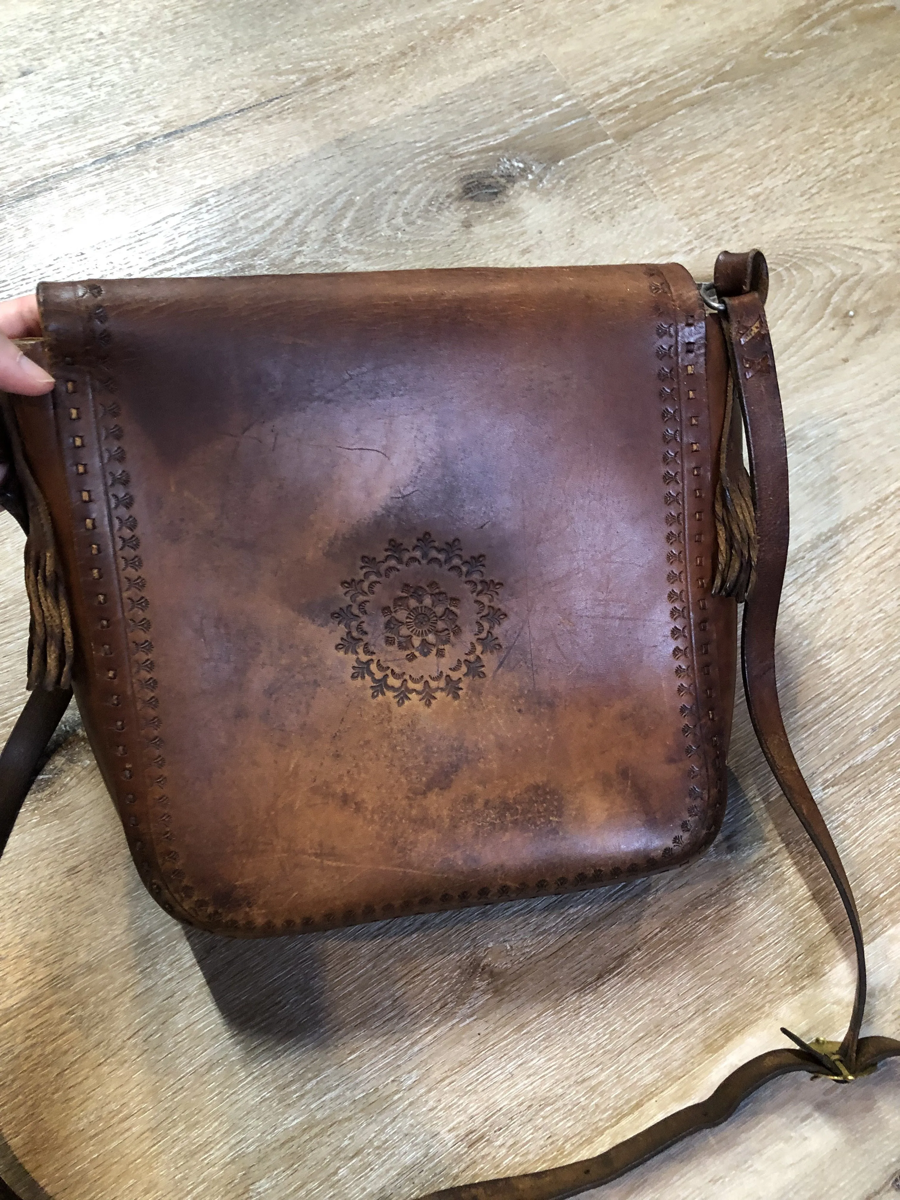 Vintage Leather Fringe Crossbody Bag with Hand Tooled Design